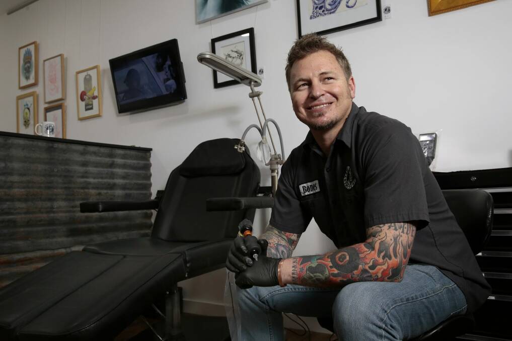 Tatts On, Tatts Off owner Peter ''Bones'' Bone is offering free realistic nipple tattoos to breast cancer survivors after reconstructive breast surgery. Photo: Jeffrey Chan