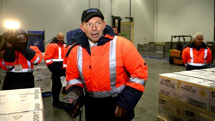 Seeking the stamp of approval: Tony Abbott at a cold storage facility in Melbourne. Photo: Penny Stephens