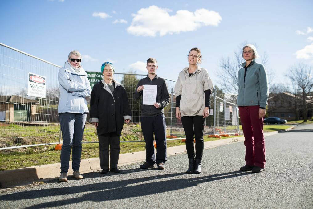 Hackett residents from left Shan Short, Tess Horwitz, Jack Taylor, Theresa Layton, and Bev Hogg, worried about the impact of townhouse development on the Fluffy blocks in their suburb. Photo: Rohan Thomson