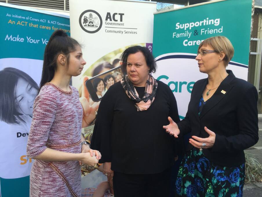 Eighteen-year-old carer Chantelle Pellegrini, Carers ACT chief executive Lisa Kelly and Community Services Minister Rachel Stephen-Smith talk about a new panel which will be convened to nut out a new carers strategy. Photo: Katie Burgess