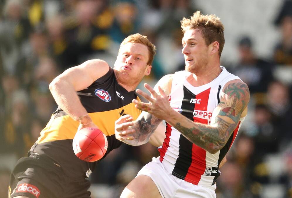 Nick Vlastuin and Tim Membrey contest the footy. Photo: Getty Images
