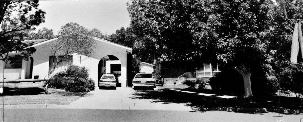 The Canberra Times crime scene reconstruction above shows where Australian Federal Police Assistant Commissioner Colin Winchester was shot dead in his car in Lawley Street, Deakin. The killer was believed to have hidden in bushes in front of Mr Winchester’s neighbour’s house before walking up towards the front of the car and shooting the police chief as he went to get out.