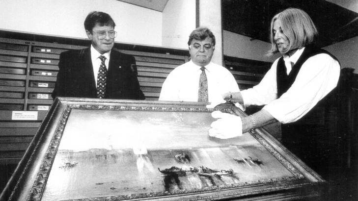 Then gallery chairman Kerry Stokes, left, his deputy Brian Johns and then director Betty Churcher examine Turner's <i> Campo Santo, Venice </i> in 1996. Photo: Richard Briggs