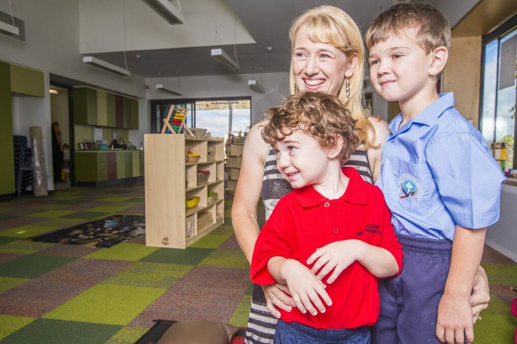 Rachel Howden with her boys Kindergarten student Alex, 3, and year 1 student Toby, 6, on their first day at the new Anglican School Googong.
 Photo: Matt Bedford