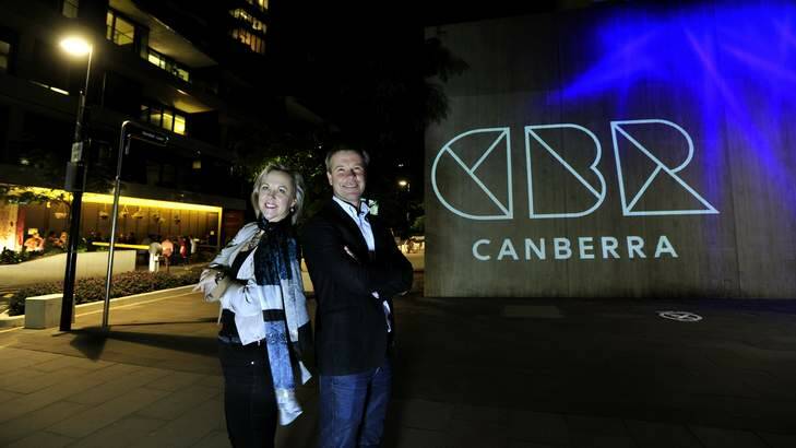 Michelle Melbourne, chair of the Canberra Business Council and Terry Shaw, managing director at Englobo group, next to the official logo. Photo: Melissa Adams
