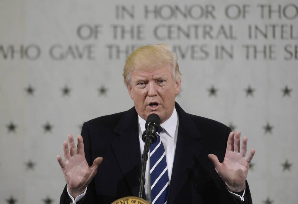 'I love you, I respect you, and you will be leading the charge.' Trump addresses the CIA last month. Photo: Bloomberg
