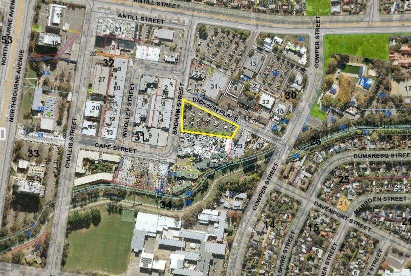 The carpark, bordered in yellow, at Block 30, Section 34, Dickson. It was one of three blocks involved in a land swap deal between the LDA and Tradies Club. Photo: Daniel Burdon