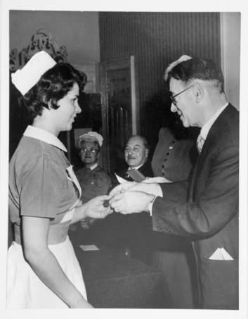 Pat Cumming receiving the gold medal for top student in nursing in 1961. Photo: Katherine Griffiths