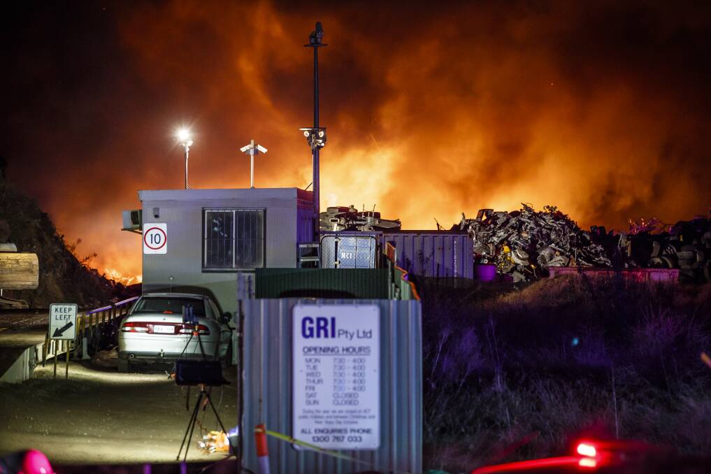 A Queanbeyan scrapyard went up in flames on Sunday night.  Photo: Sitthixay Ditthavong.