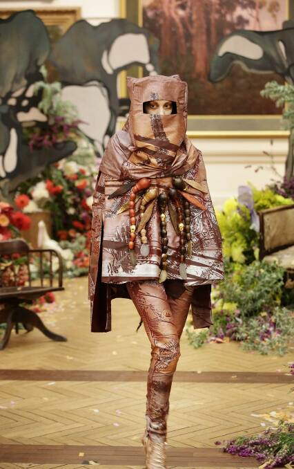 A Ned Kelly-inspired outfit  homage at the Romance Was Born show at Art Gallery of NSW on Thursday. Photo: Jessica Hromas