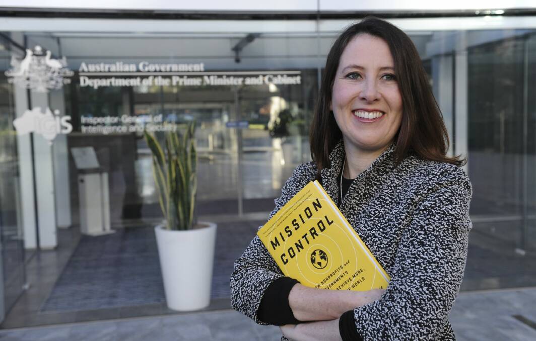Liana Downey, a strategic adviser for not-for-profit organisations, with her book Mission Control. Photo: Graham Tidy.