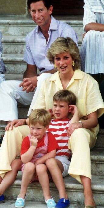 'Her love for them was almost obsessive': The Prince and Princess of Wales on holiday with their children in 1987. Photo: Getty Images