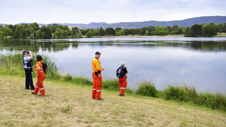 Police and SES continue the search for a missing windsurfer on Lake Tuggeranong. Photo: Melissa Adams