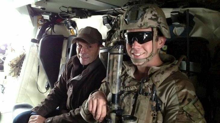 Embedded ... Tony Abbott visits troops in Afghanistan in this image from his Twitter account. Photo: Supplied