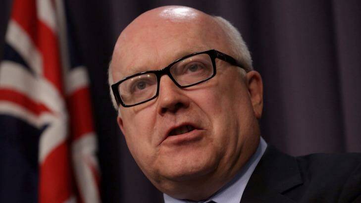 Attorney-General George Brandis say royal commission findings were "very damning" of Julia Gillard. Photo: Andrew Meares