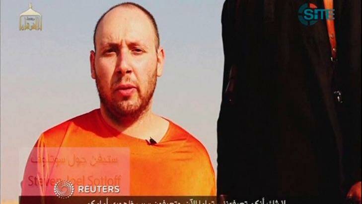 HORROR: Journalist Steven Sotloff is seen in a still image from a video released by the Islamic State, purporting to show his beheading. Photo: Reuters
