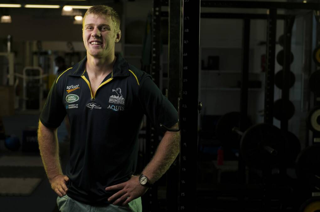 Nothing can wipe the smile off Tom Staniforth's face after signing a new Brumbies contract. Photo: Jay Cronan