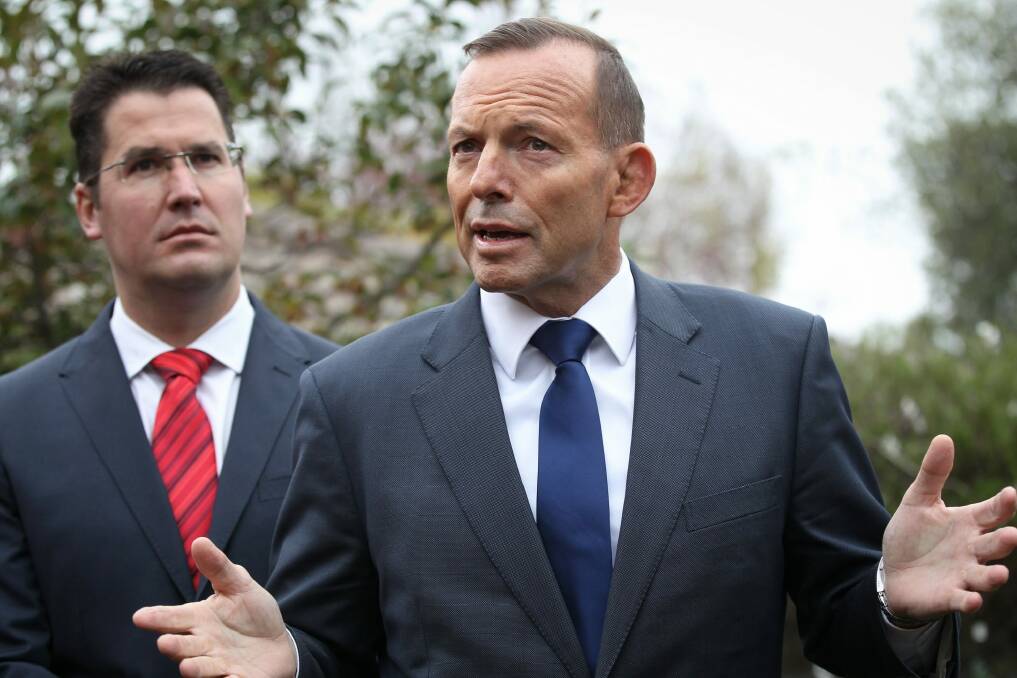 At odds? Senator Zed Seselja, left, and Prime Minister Tony Abbott. Photo: Alex Ellinghausen