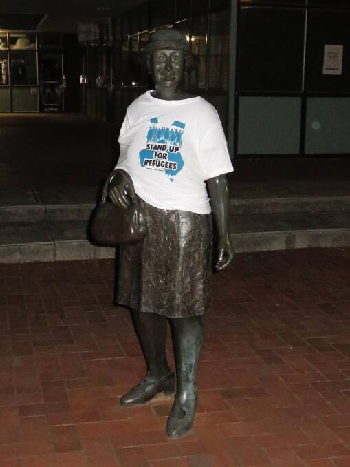 The Stepping Out statue in Hughes politically decorated. Photo: act\ian.warden