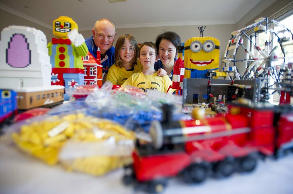 Matthew, James, Thomas and Tamara Dadswell prepare Lego wonders for the upcoming BrickExpo. 
 Photo: Jay Cronan