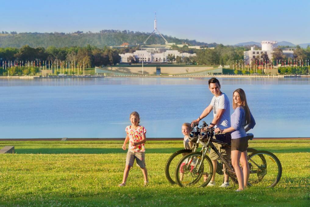 Autumn is the best season for cycling around the lake. Photo: Visit Canberra
