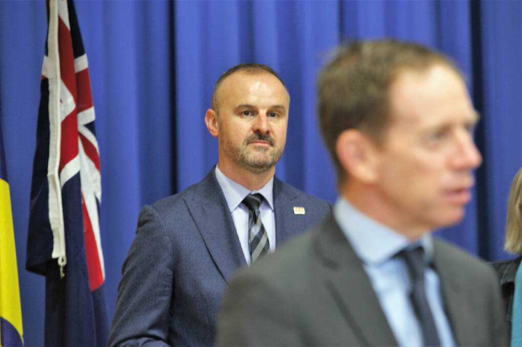 Chief Minister Andrew Barr stands behind Greens leader Shane Rattenbury at an event marking two years of their parliamentary agreement. The Greens are now threatening to vote down Mr Barr's CTP bill unless changes are made.  Photo: Katie Burgess