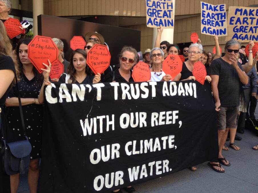 Protesters gathered as Adani's local mining chief executive Jeyakumar Janakaraj spoke at a business lunch in Brisbane. Photo: Supplied