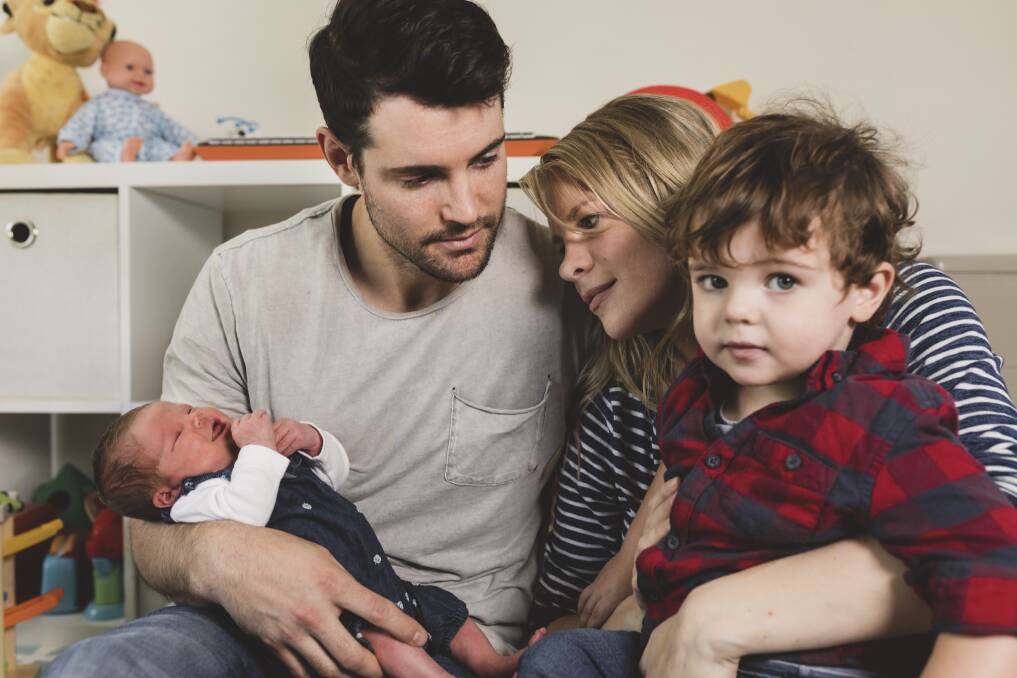 Andrew and Kirbie Barrell with their son Finn, 2, and baby Isabel. Photo: Jamila Toderas