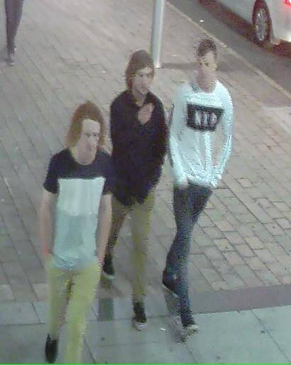 The alleged offender (middle) pictured with two other men. Photo: Supplied