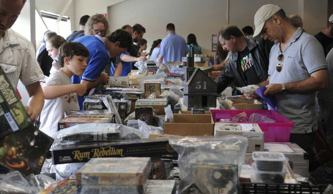 Secondhand games for sale at CANCON. Photo: Graham Tidy