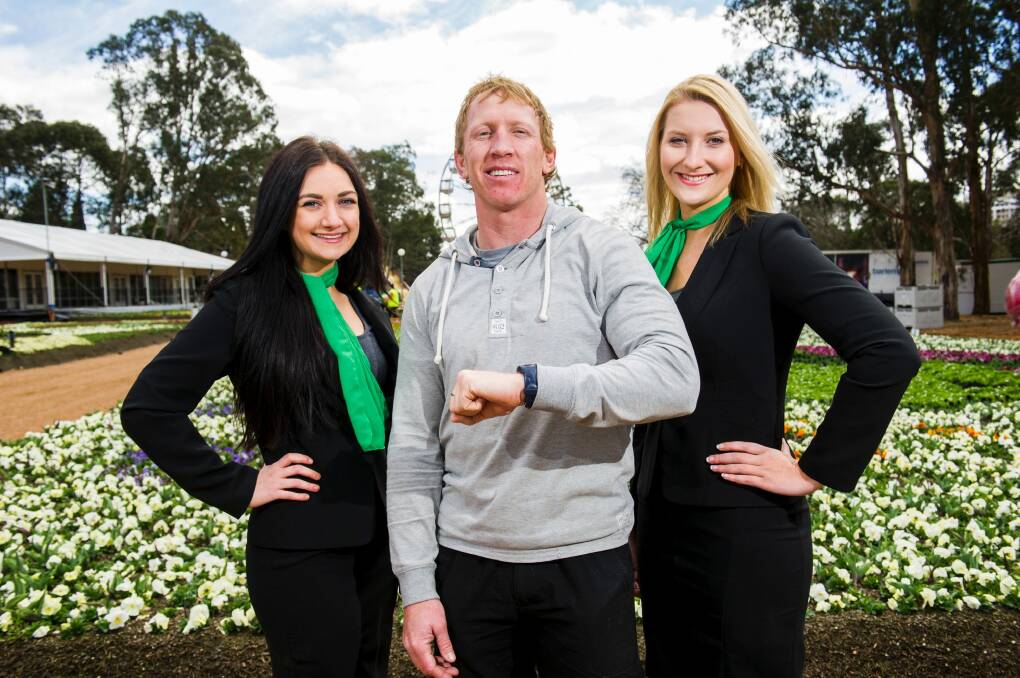 Blooming good: On the final weekend of Floriade, Alan Tongue, pictured with the Emeralds' Clare Sheehan and Brittney Gould, will lead a free boot camp session at Stage 88. Photo: Rohan Thomson