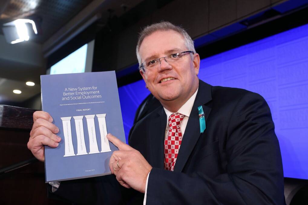 Social Services minister Scott Morrison with the McClure report. Photo: Andrew Meares