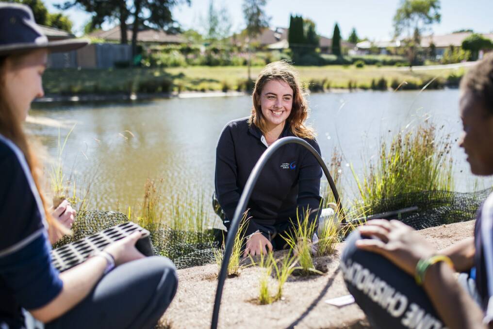 Student Alison Piper: Colleagues from Caroline Chisholm High School will keep a photo journal of the plants' growth as part of the trial. Photo: Rohan Thomson