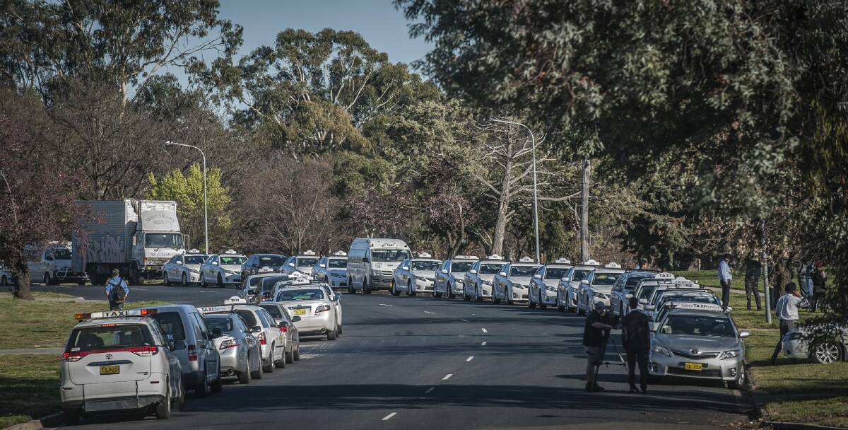 Canberra's striking taxi drivers gather in Kingston for the beginning of their three-hour strike. Photo: Karleen Minney