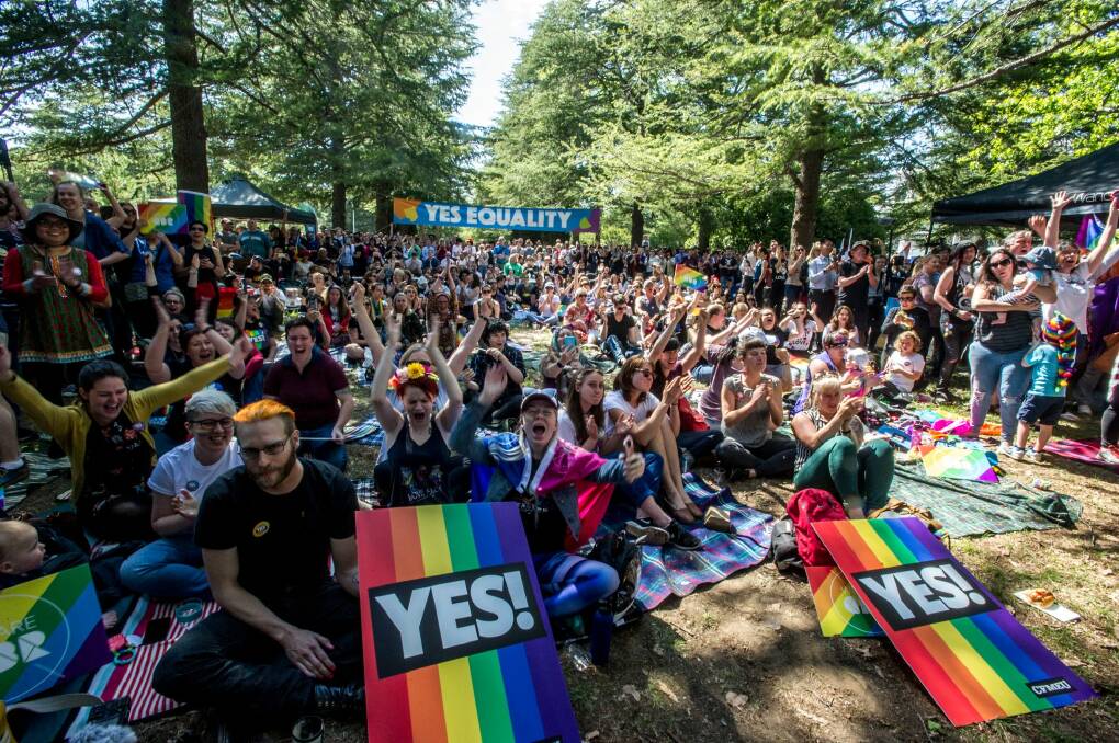 Canberrans react to the 'yes' vote in Haig Park on Wednesday. Photo: Karleen Minney
