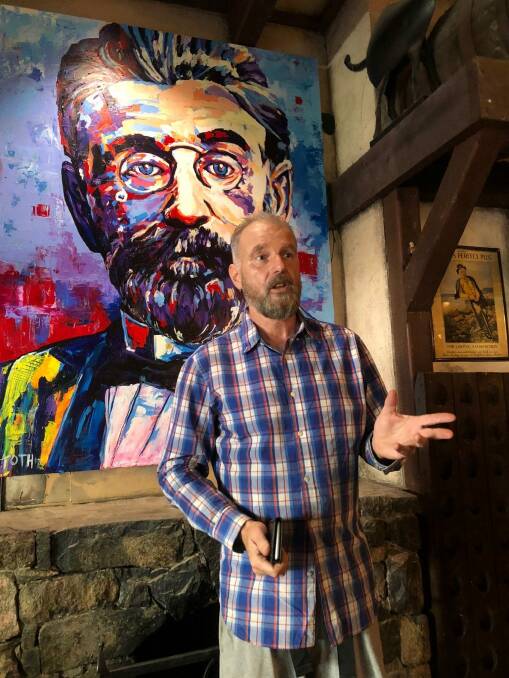 King O'Malley's owner Peter Barclay with the new portrait of the pub's namesake, King O'Malley. Photo: supplied