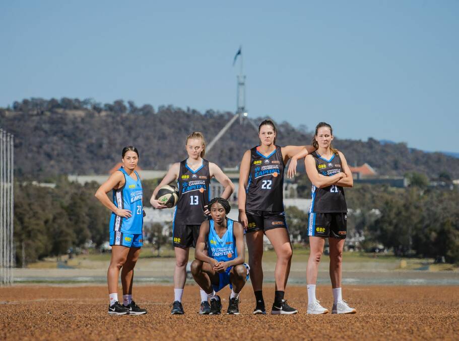 Canberra Capitals' Maddison Rocci, Abigail Wehrung, Eziyoda Magbegor, Lauren Scherf and Keely Froling. Photo: Sitthixay Ditthavong