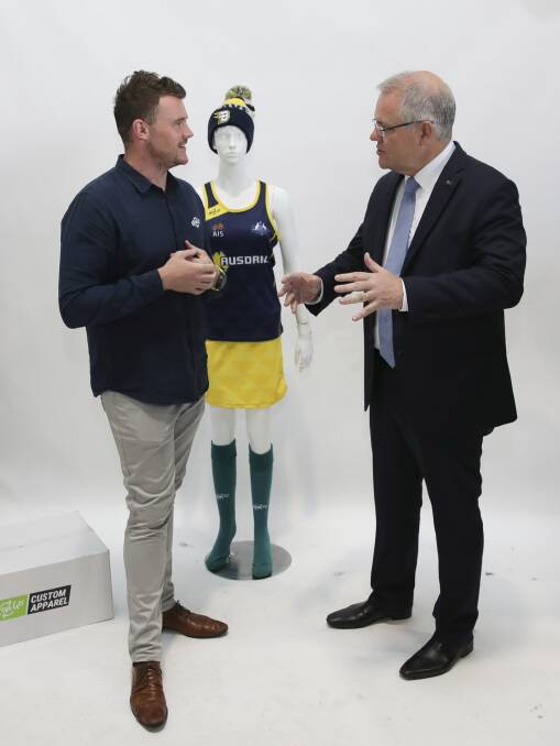 ONTHEGO founder and CEO Mick Spencer with Prime Minister Scott Morrison at the company's headquarters in Canberra this week. Photo: Alex Ellinghausen