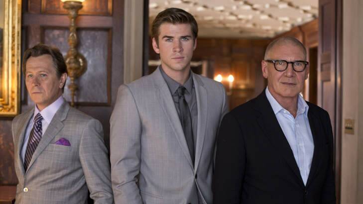 Win it ... Gary Oldman, Liam Hemsworth and Harrison Ford in <i>Paranoia</i>.