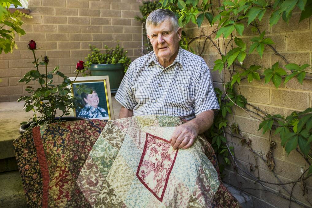 Ian Holyland, whose wife Barbara died in 2011, keeps her memory alive with the help of a floral quilt donated by Gift of Life.  Photo: Jamila Toderas
