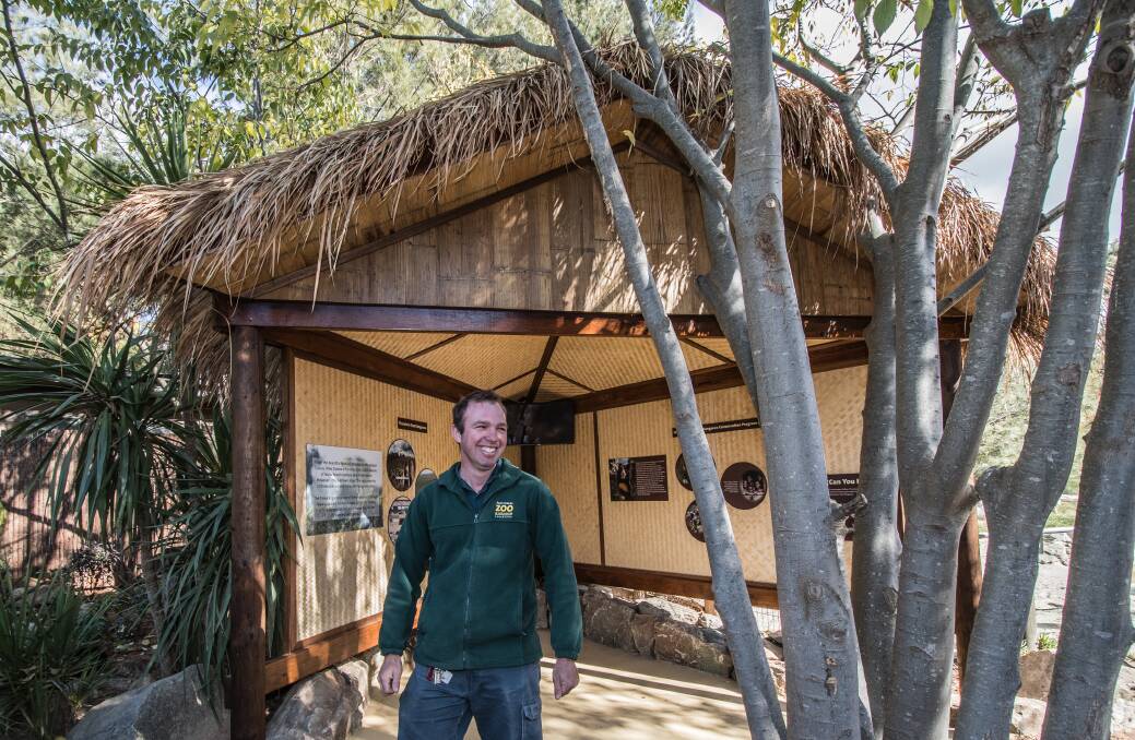 Zookeeper Brendan Sheean inside the new tree kangaroo conservation hut. Photo: Karleen Minney