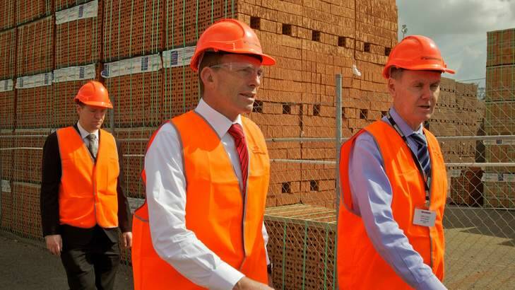 Then opposition leader Tony Abbott at the Austral Brickworks to discuss carbon tax issues with workers. Photo: Brendan Esposito