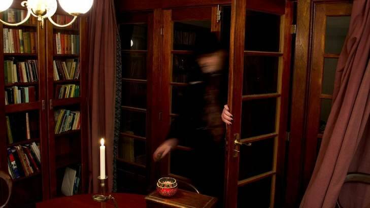 Geoffrey Darkholme 'ghosts' into a seance. Photo: Andrew Wade