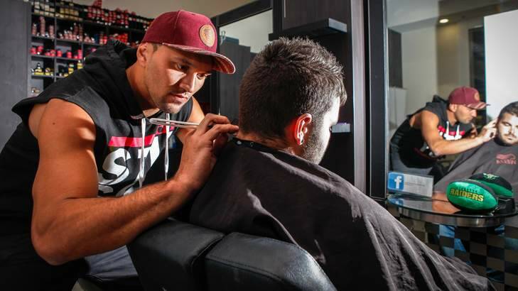 Canberra Raiders player Jordan Rapana works occasionally as a barber at John Brennan Hair in Belconnen. Rapana was selected for the Cook Islands for the upcoming rugby league World Cup. Photo: Katherine Griffiths