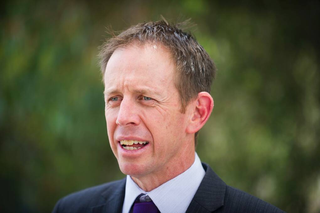 ACT Road Safety Minister Shane Rattenbury admitted the issue of mandatory bike helmets in Canberra was a vexed one. Photo: Dion Georgopoulos