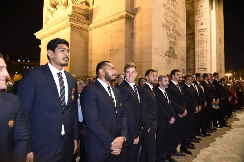 The Wallabies attend a ceremony at the Tomb of the Unknown Soldier at the Arc de Triomphe. Photo: AFP