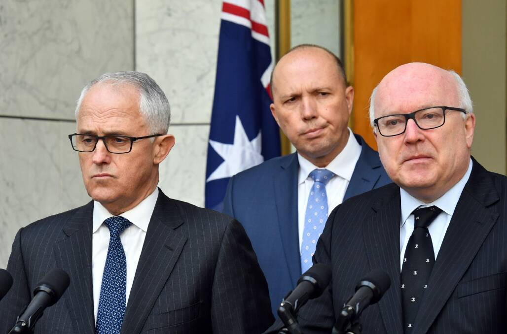 Minister for Immigration Peter Dutton and Attorney-General George Brandis announce a new home affairs department at a press conference at Parliament House in Canberra Photo: Mick Tsikas