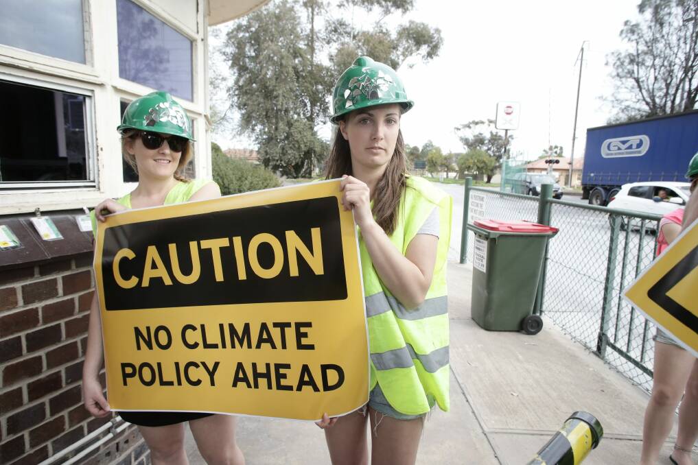 Protesters wait for then opposition leader Tony Abbott during his visit to Penrice Soda Holdings in Port Adelaide, in  September 2013.  Photo: Alex Ellinghausen