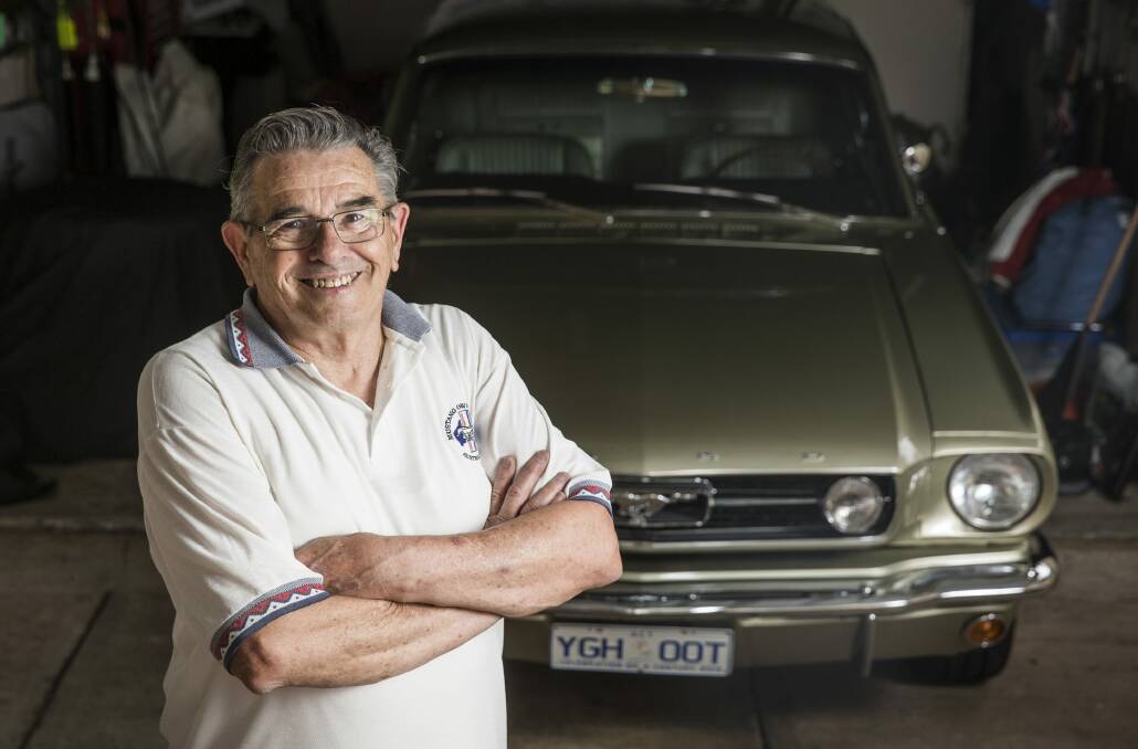 Reg Johnson and his restored Mustang at his home in Fisher. Photo: Matt Bedford