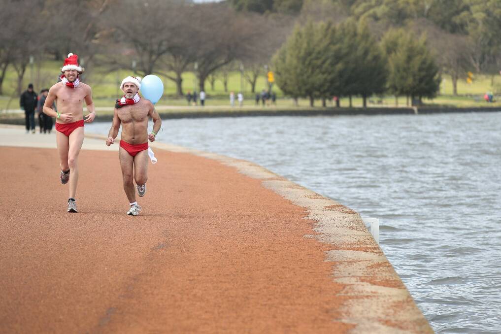 Two brave runners from last year's 6500 Santa Speedo Shuffle in aid of Cystic Fibrosis ACT Photo: Jeffrey Chan